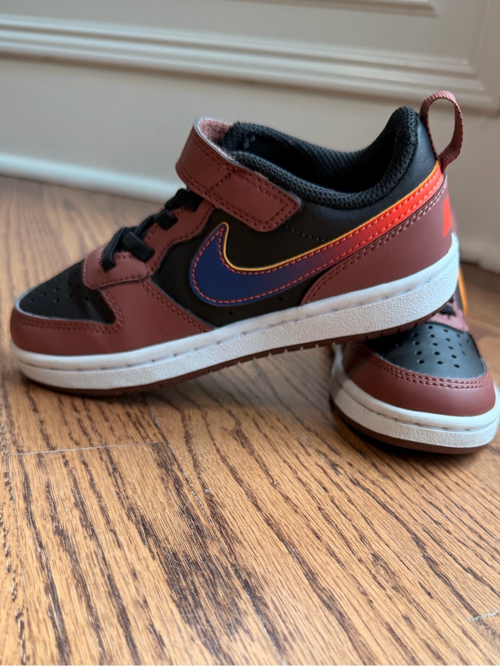 Nike Boys brown & black sneakers, orange & blue swoosh